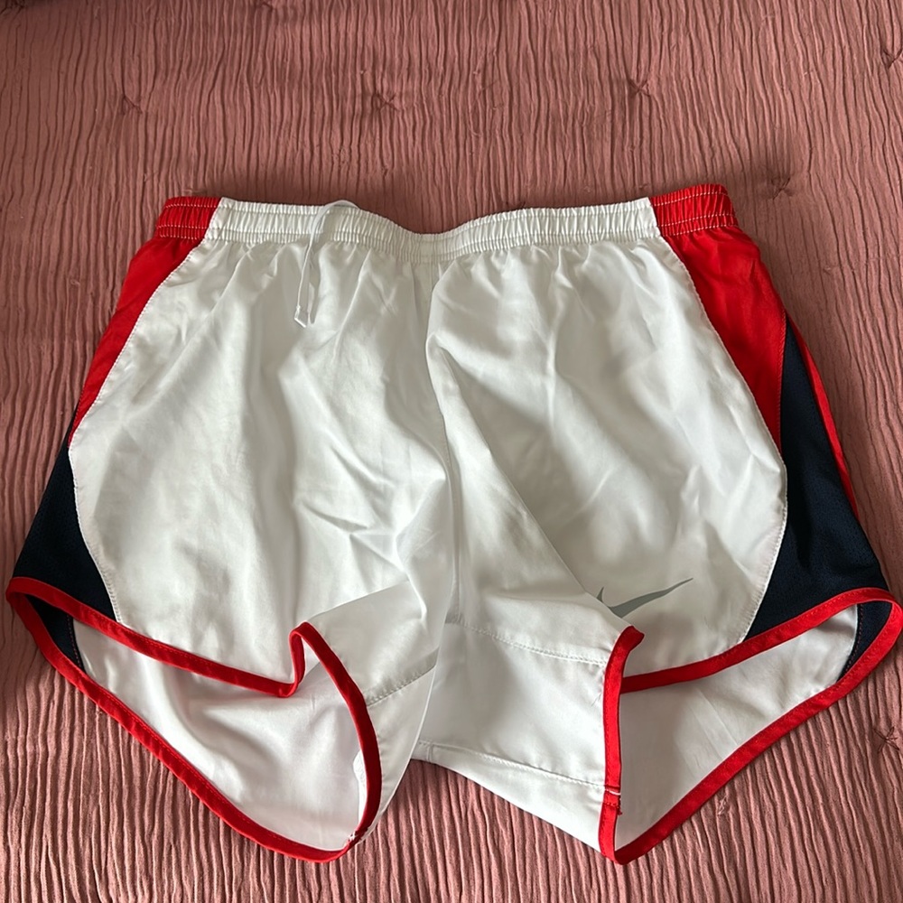 red white and blue nike athletic shorts